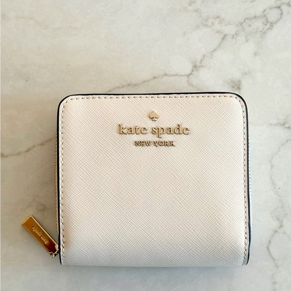 kate spade Handbags - NWOT Kate Spade Staci Small Zip Around Bifold Wallet - Parchment
